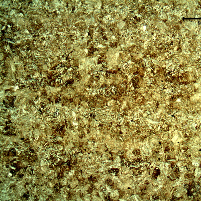 Micrography of the high strenght steel, heat treated, of the casting device. The microstructure is bainitic martensitic.