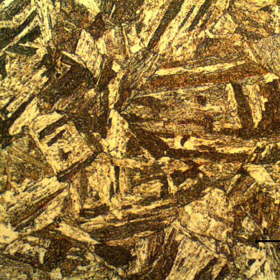 Micrographic detail of the aged martensitic structure. The bolt presented variations in the previous austenite grain boundaries from the center of the thickness to the surface. No delta ferrite or retained austenite islands are evidenced.