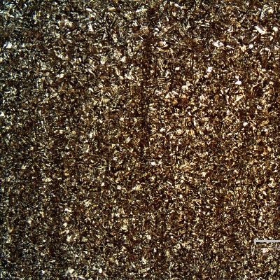 Micrography of a longitudinal section, in the center of a non-broken bolt that operated in the same assembling, presenting an aged martensitic structure, similar to the broken bolt.