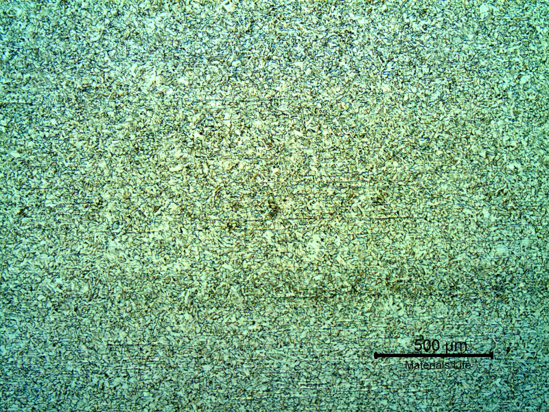 Micrography of the pipe transverse section presenting a granular microstructure.