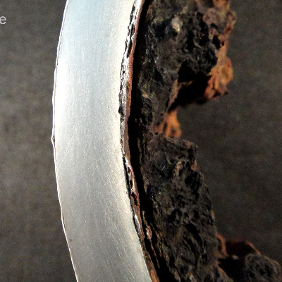 Detail of the transverse section of the 4" pipe 90° from the seam weld.  The thickness of the pipe is 8 mm.  No evidences of general corrosion or pitting were identified.