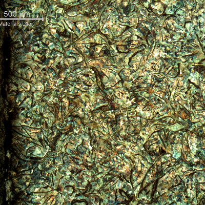 Micrography of the longitudinal section of the cylinder, at the internal diameter (left side of the figure), in contact with the treated cooling water, presenting large graphite flakes in a predominatly perlitic matrix.