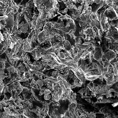The fracture surface of the casting cylinder presented, close to the external surface, a more ductile aspect of the fracture.