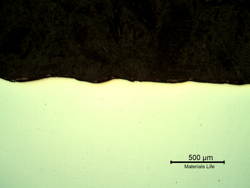 Micrography of the plate section, as polished, close to the surface that suffered the impact.  No evidences of damage.