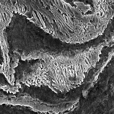 Micrographic detail of the ferritic-pearlitic structure close to the region where the projectile penetrate the plate.