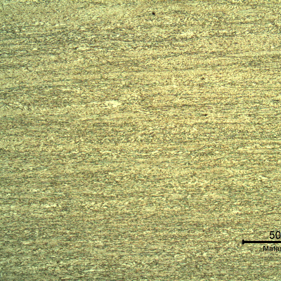 Micrography of the plate in the middle of the thickness, showing the aligned structure tyical of a rolling process. The sample was mechanically-electrolitically polished and etched with HF (10%) + HNO3 (5%) +H2O (85%) solution.