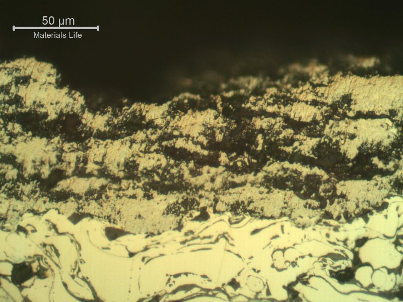 Micrographic detail of the WC (tungsten carbibe) surface layer, degradated and partially removed.