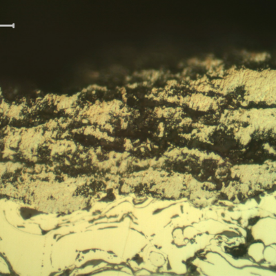 Micrographic detail of the WC (tungsten carbibe) surface layer, degradated and partially removed.