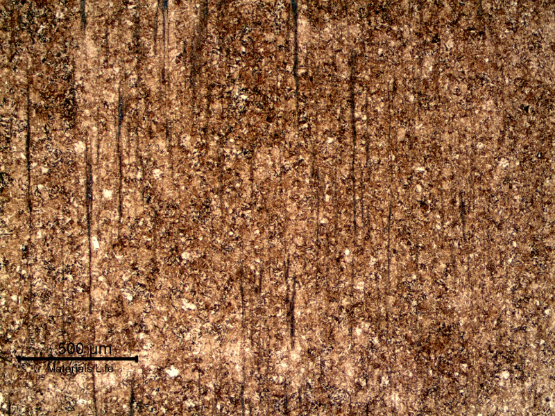 Microstructural aspect of a longitudinal section of the nut, in the middle of the thickness. Martensitic structure, banded.