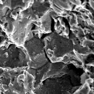 Scanning electron microscope fractographic detail of the brittle intergranular micromechanism.