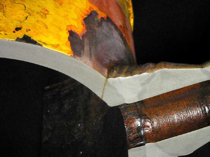 Macrography of a transverse section of the 8" pipe, cut exactly in the middle of the lateral 2" branch line, showing the through thickness crack initiated at the margin of the weld, in the upper part of the pipe.