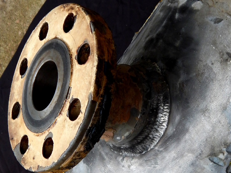 Duplex stainless steel piping, in a region where the 14" ND pipe is only 5mm thick and the branch is a weldolet (forged fitting) welded to the pipe and to the flange, a lot more thicker than the pipe.