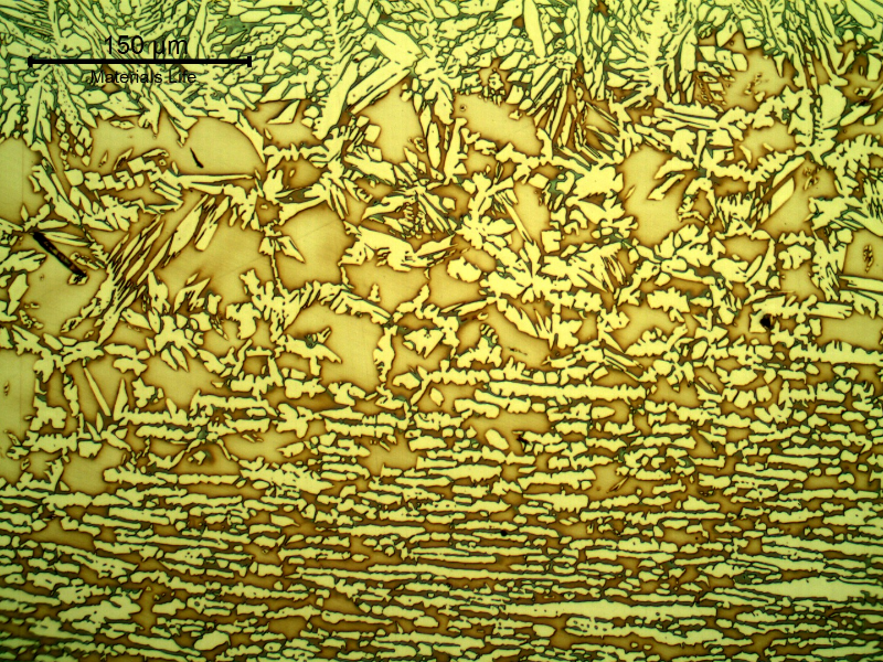 Micrography of the heat affected zone of the pipe to the fitting, at the pipe position. Base metal to the bottom of the figure and fusion line to the top.