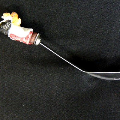 Lateral view of the fork showing the profile. The scoop convex depth is 10 mm and the handle concave depth is 3 mm. The overal thickness of the part is 1 mm.