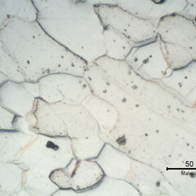 Micrographic detail of the ferritic grains with elongated morphology in the center of the transverse section, curved.
