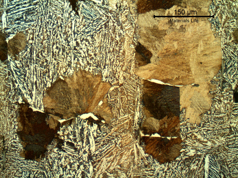 The coarse structure in the center of the shaft thickness is evidenced by free ferrite islands at the previous austenite grains. The presence of a pearlitic structure evidences the slow cool of the material.