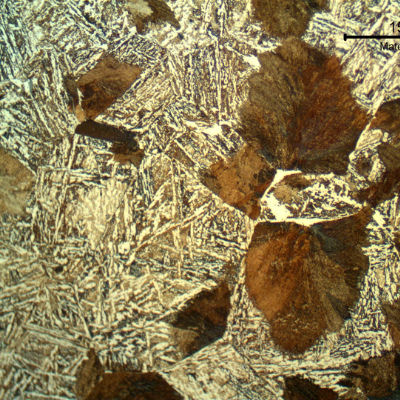 The longitudinal section of the shaft, at the surface, presenting only a small refining in the previous austenite grain boundaries than in the center, indicating that the material was slowed colled from forming and not heat treated.