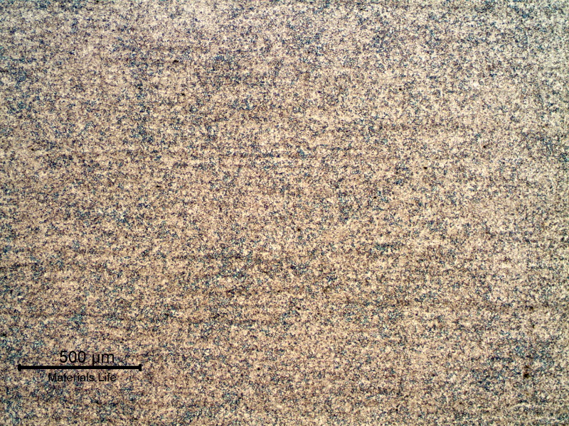 Micrography of the pipe base metal, in a longitudinal section, presenting a slight banding and a refined structure.
