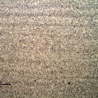 Micrography of the pipe base metal, in a longitudinal section. The ferritic structure is refined and it is possible to identify a small variation in the ferritic grain size, that is promoting the slight banding effect.
