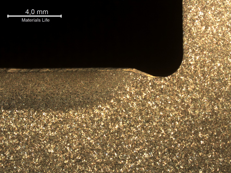 Macrographic detail of the hardened layer, about 3mm deep from the surface. Important to observe that the bearing is not heat treated in the radius, only in the contact area.  The hardness at the surface is 430HV and the hardness in the base metal is 260HV.