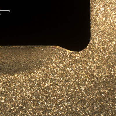 Macrographic detail of the hardened layer, about 3mm deep from the surface. Important to observe that the bearing is not heat treated in the radius, only in the contact area.  The hardness at the surface is 430HV and the hardness in the base metal is 260HV.