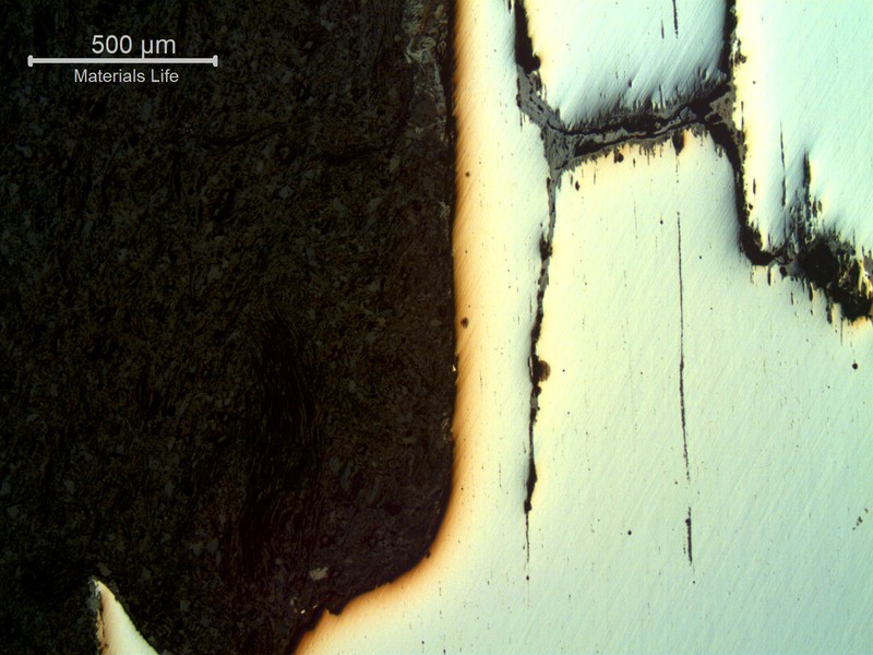 Micrography of a typical as polished corrosion-fatigue mechanism, in a longitudinal section. The loss of material is accelerated a lot by the cracks through the thickness.