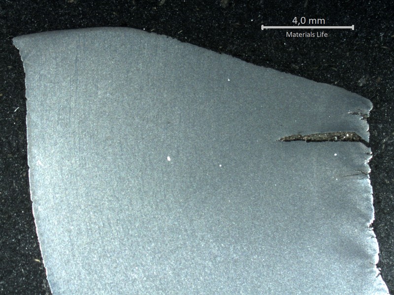 Macrography of a longitudinal section of the pipe at the fracture position, in the thicker thickness. The external side of the pipe (OD) is to the rigth side of the figure, and the internal side of the pipe is to the left of the figure. There are several secondary cracks, opened to the OD, created during bending.