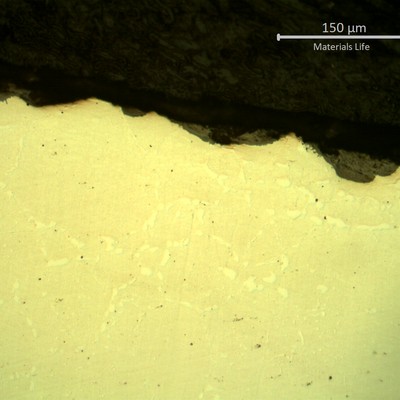SAMPLE 3, CLOSE TO THE SURFACE OF SIDE B - Micrography, as polished, of the oxides at the electric furnace environment side.  In this region the oxide layer is thinner than in the process side.