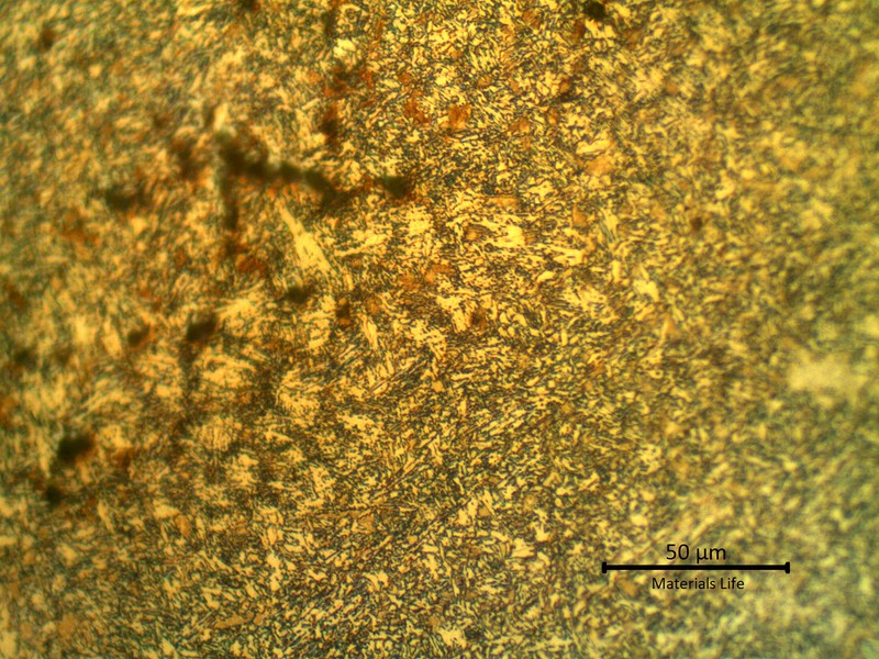 Micrographic detail of the weld metal presenting hot cracks, at interdendritic positions, interconected.