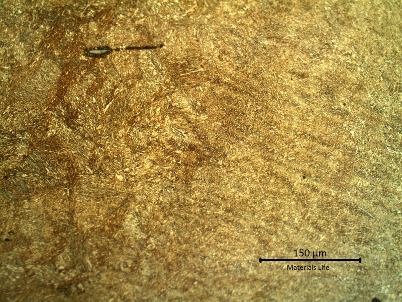 Micrography of the weld repair at the fusion line.  Weld metal to the right and heat affected zone to the left.