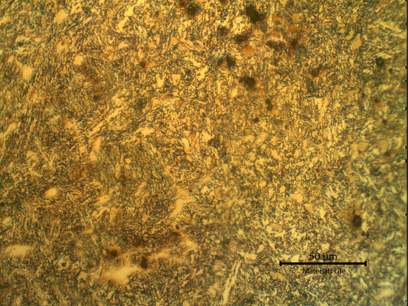 Microstructure of the weld metal close to the fusion line, showing that the dilution effects created zones of higher carbon content, creating a martensitic plus retained austenite microstructure.