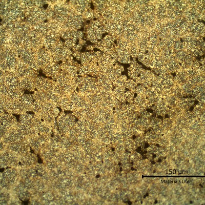 Micrography of the weld repair at the fusion line.  At this magnification it is possible to identify several voids at interdendritic positions.