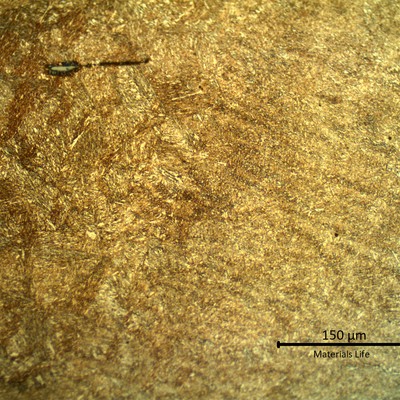 Micrography of the weld repair at the fusion line.  Weld metal to the right and heat affected zone to the left.
