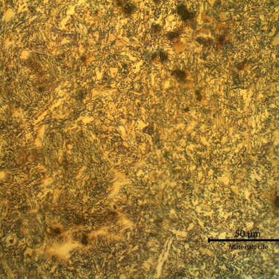Microstructure of the weld metal close to the fusion line, showing that the dilution effects created zones of higher carbon content, creating a martensitic plus retained austenite microstructure.