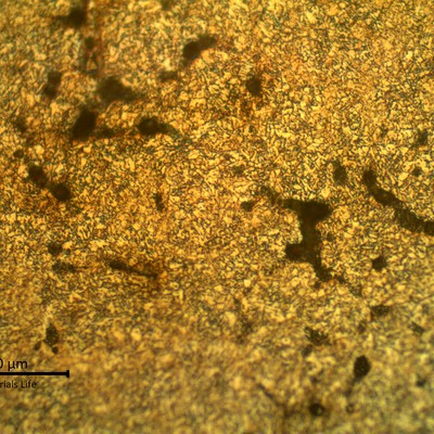 Micrographic detail of the weld metal presenting hot cracks, at interdendritic positions, interconected.