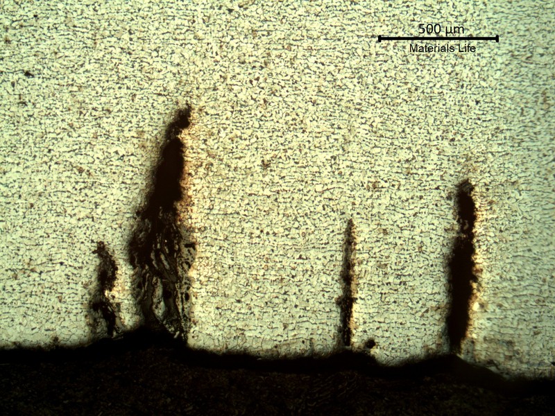 Low magnification micrography of the multiple cracks, parallel, transgranular. No evidences of microstrutural changes (heat evolution or decarburization).
