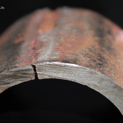 Throught wall cracking of the waterwall tube at the leakage position, thick edged,  The external surface of the tube was grounded to remove the membrane and the cracking is associated to the tube attachement.