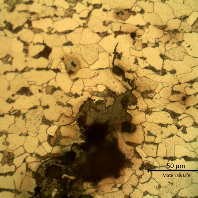 Micrographic detail of the transgranular cracking, filled with oxides.