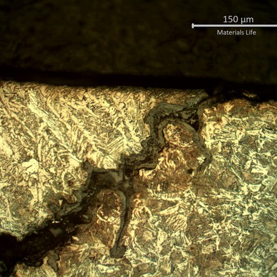 Micrography of the external tube surface, presenting the cracking at the margin of the weld. This cracking could have been created by thermal induced cycles (fatigue), but it did not propagate into the tube wall.