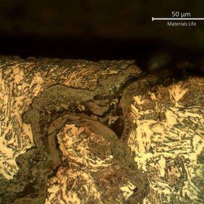 Micrographic detail of the external tube surface with the crack at the weld margin.