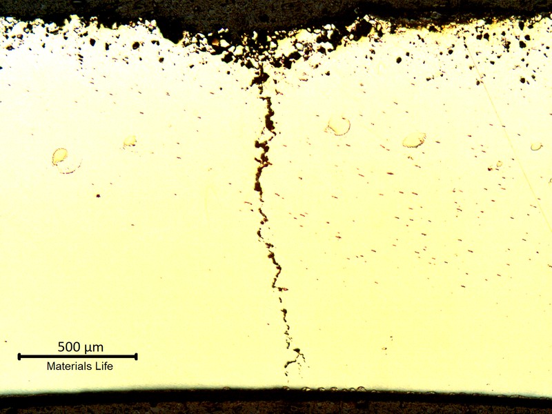 Micrography of a transverse section of the bent tube, external surface (OD) to the top and internal surface (ID) to the bottom of the figure. At the through wall cracking position, the external surface presented a layer of intergranular corrosion.