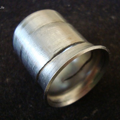 Aspect of a flared tubing, cold deformed at 37°, and the circumferential cracking.