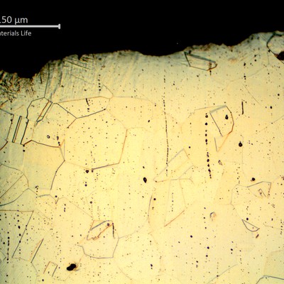 Micrography of a longitudinal section of the flared tubing where the fracture occurred. The starting point of the fracture is associated to the external side of the tubing, where it was connected by a nut and there was a localized plastic deformation due to the fitting assembly.