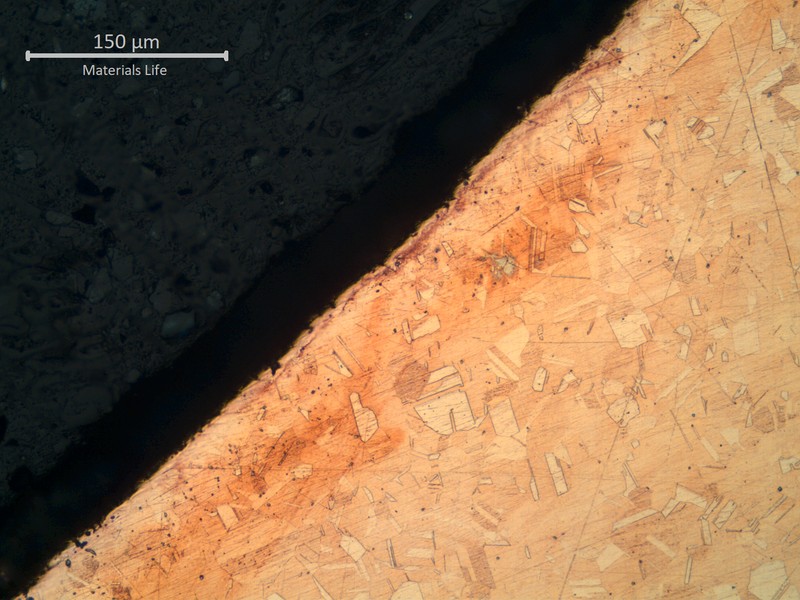 Micrography of a transverse section of the tube at the localized reduced thickness point.  Close to the internal surface.
