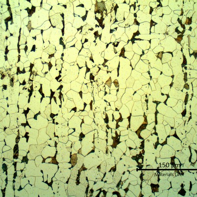 Metallographic detail of the longitudinal section of the clamp with a ferritic pearlitic structure.