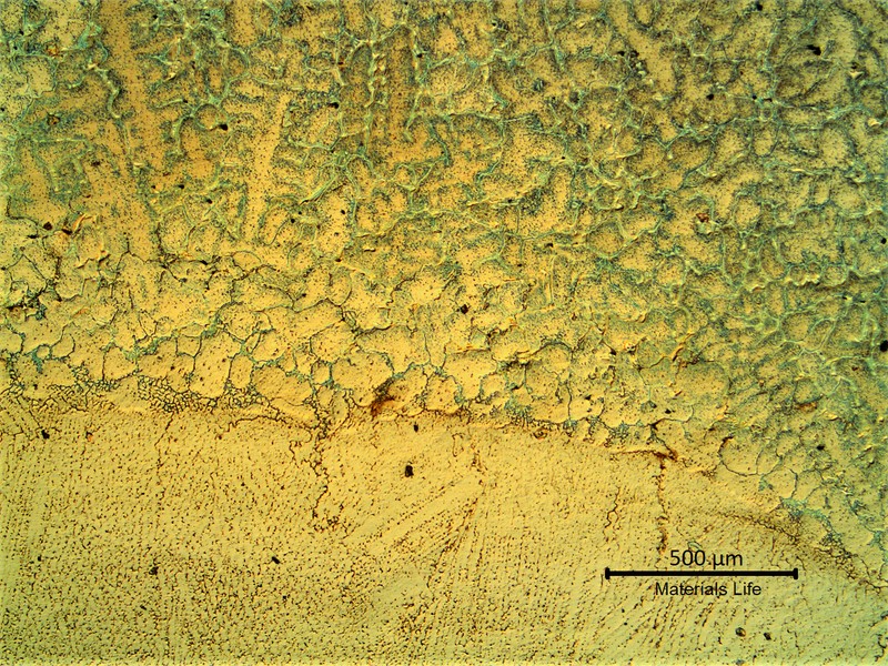 Fusion line between the aged base metal (in the top) and the weld metal (in the bottom). The adopted filler metal is similar to the base metal.