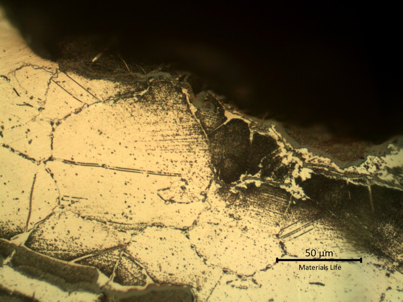 Detailed microstructure of the heat affected zone, fully carburized and cracked intergranular. Large austenitic grain size.