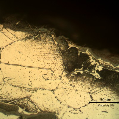 Detailed microstructure of the heat affected zone, fully carburized and cracked intergranular. Large austenitic grain size.