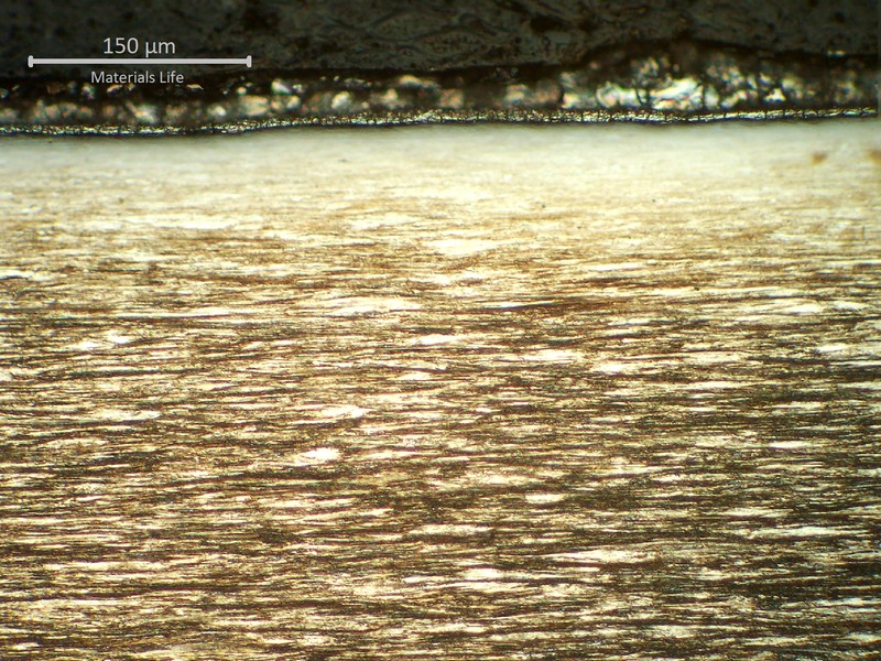 Metallographic aspect of the wire surface in the core wire of the IWRC, presenting the galvanized layer.