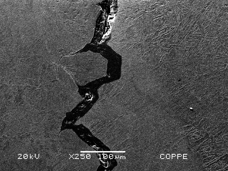The intergranular morphology of the cracks, at the heat affected zone of the forging, indicates it is a cold cracking probably formed when the welded joint was not yet post welding heat treated. The actual hardness values at the HAZ is 270HV10, and when it was cracked it was probably a lot higher.